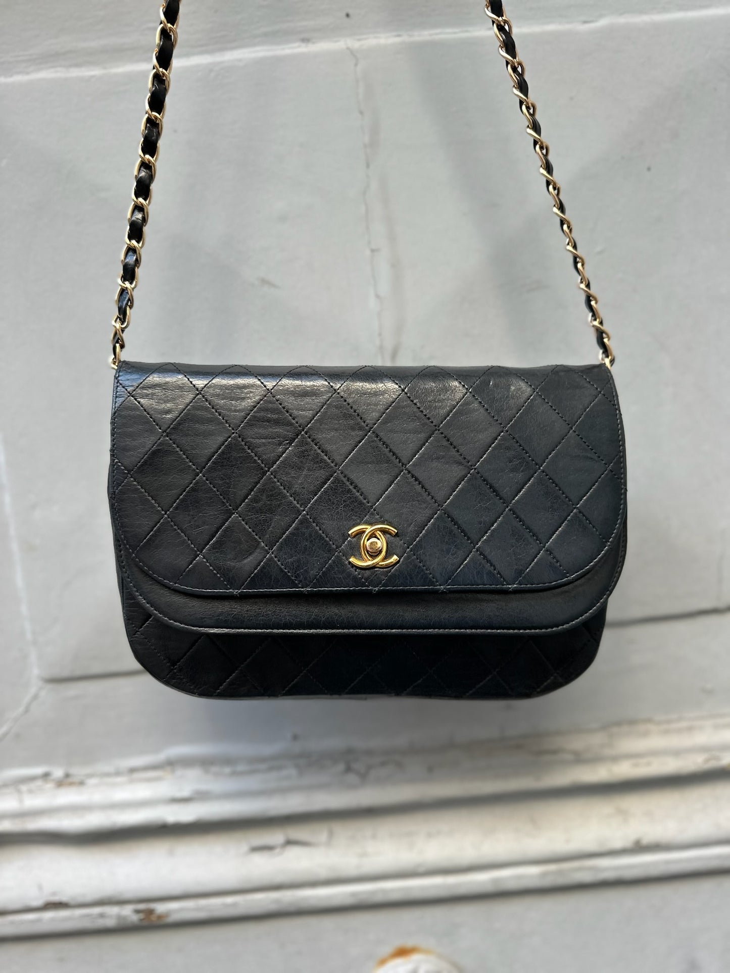 double flap half moon bag