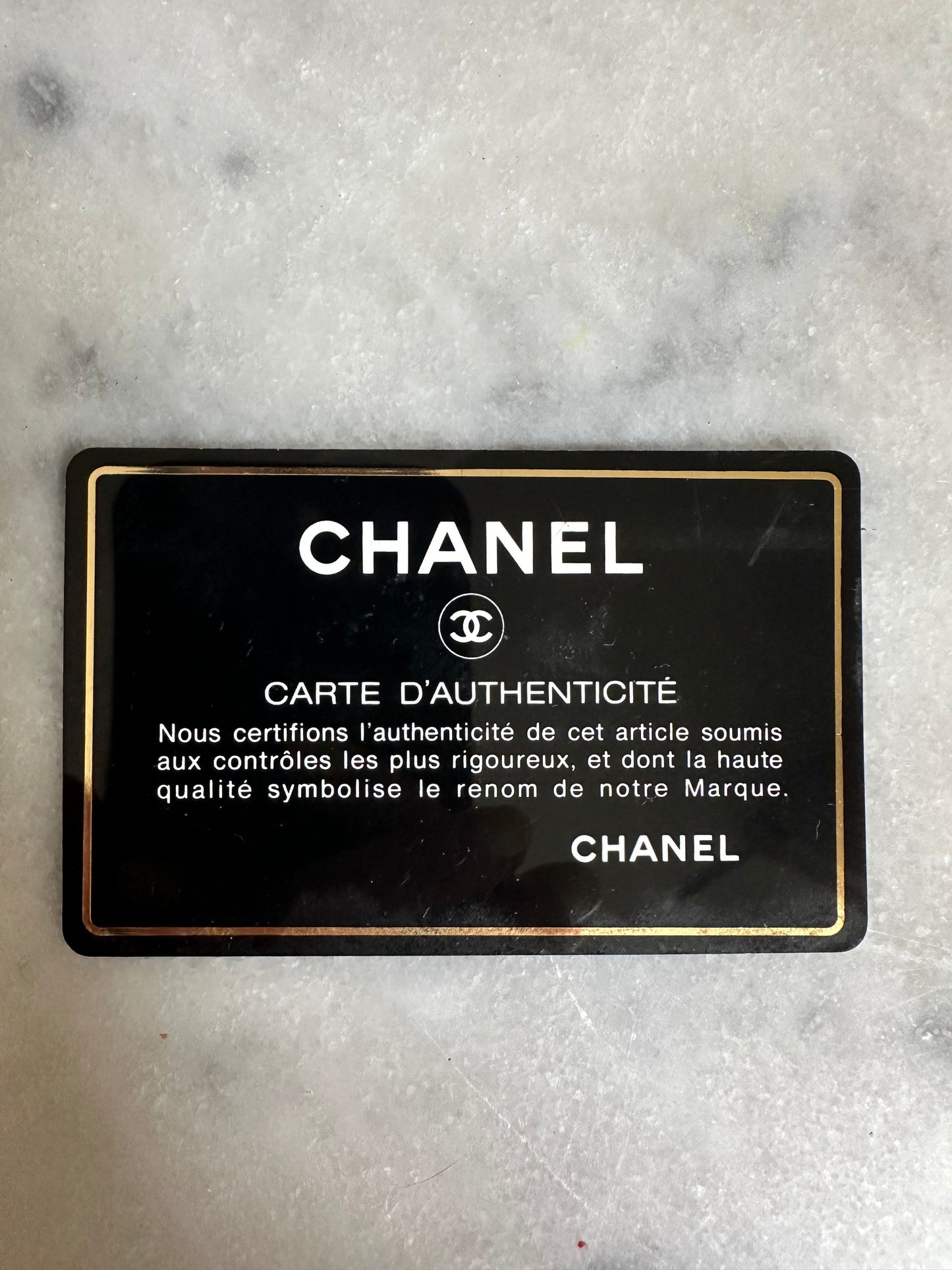 Chanel mini classic single flap bag in black silk