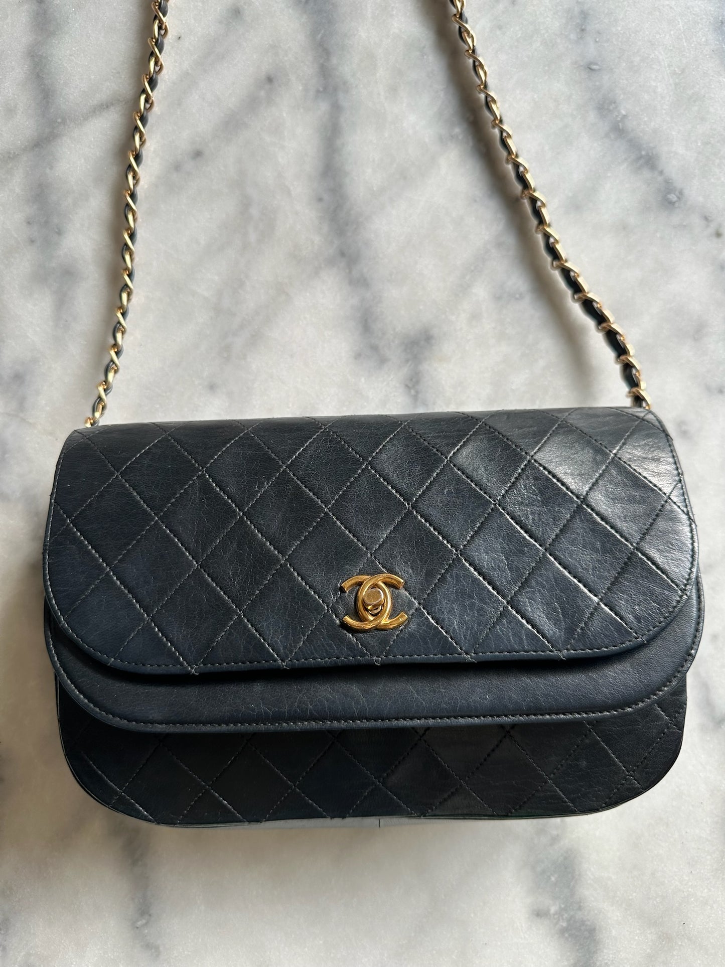 double flap half moon bag