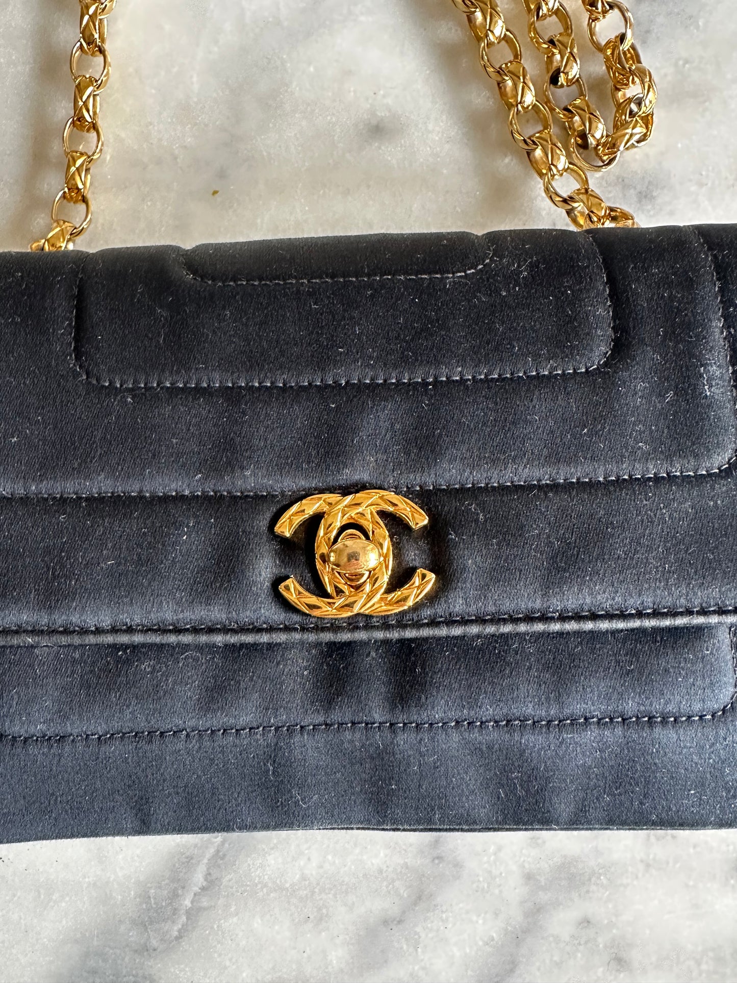 Chanel mini classic single flap bag in black silk