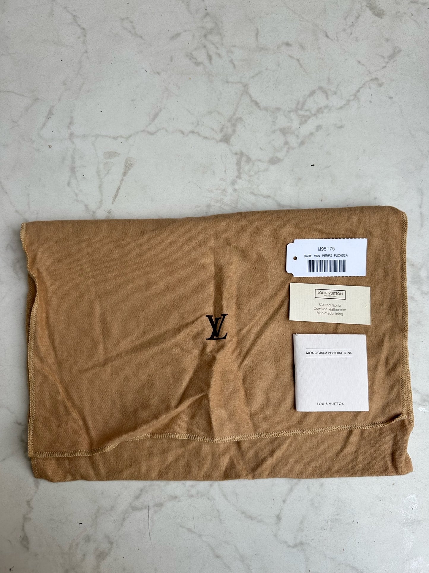 Perforated Monogram Canvas Fuschia Mini Trocadero