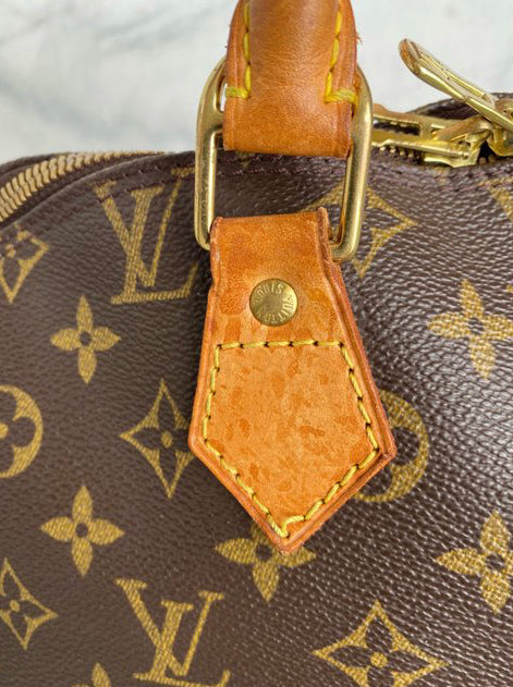 Alma leather handbag