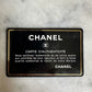 Chanel mini classic single flap bag in black silk
