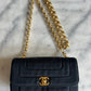Chanel mini classic single flap bag in black silk
