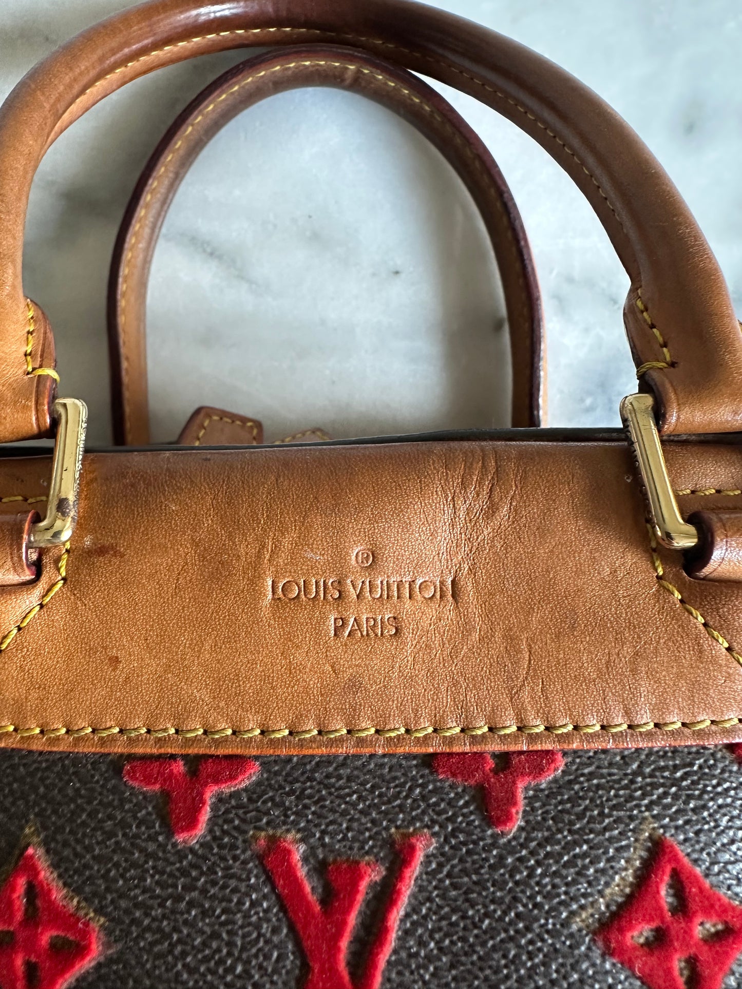Louis Vuitton rouge monogram Tuffetage Deauville bag