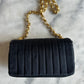 Chanel mini classic single flap bag in black silk