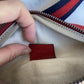 Coco Capitán clutch bag